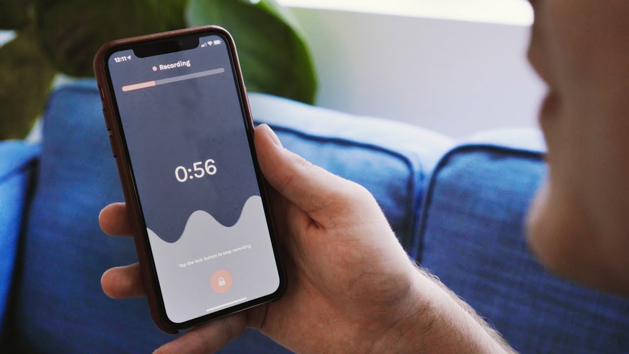 A person recording a podcast with professional equipment and making money from it